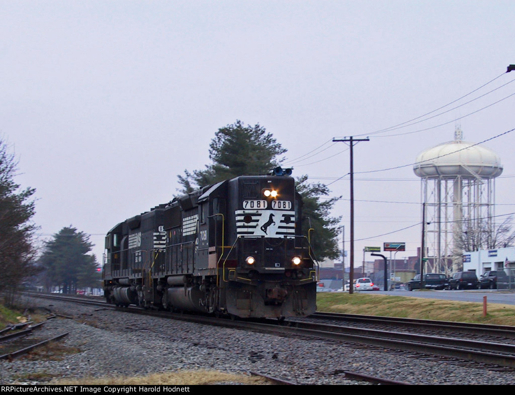 NS 7081 leads a light engine move northbound as symbol P02